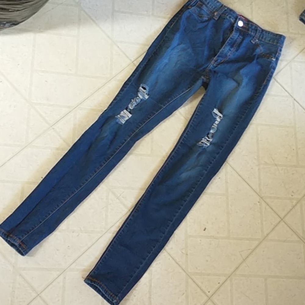 Skinny blue ripped jeans